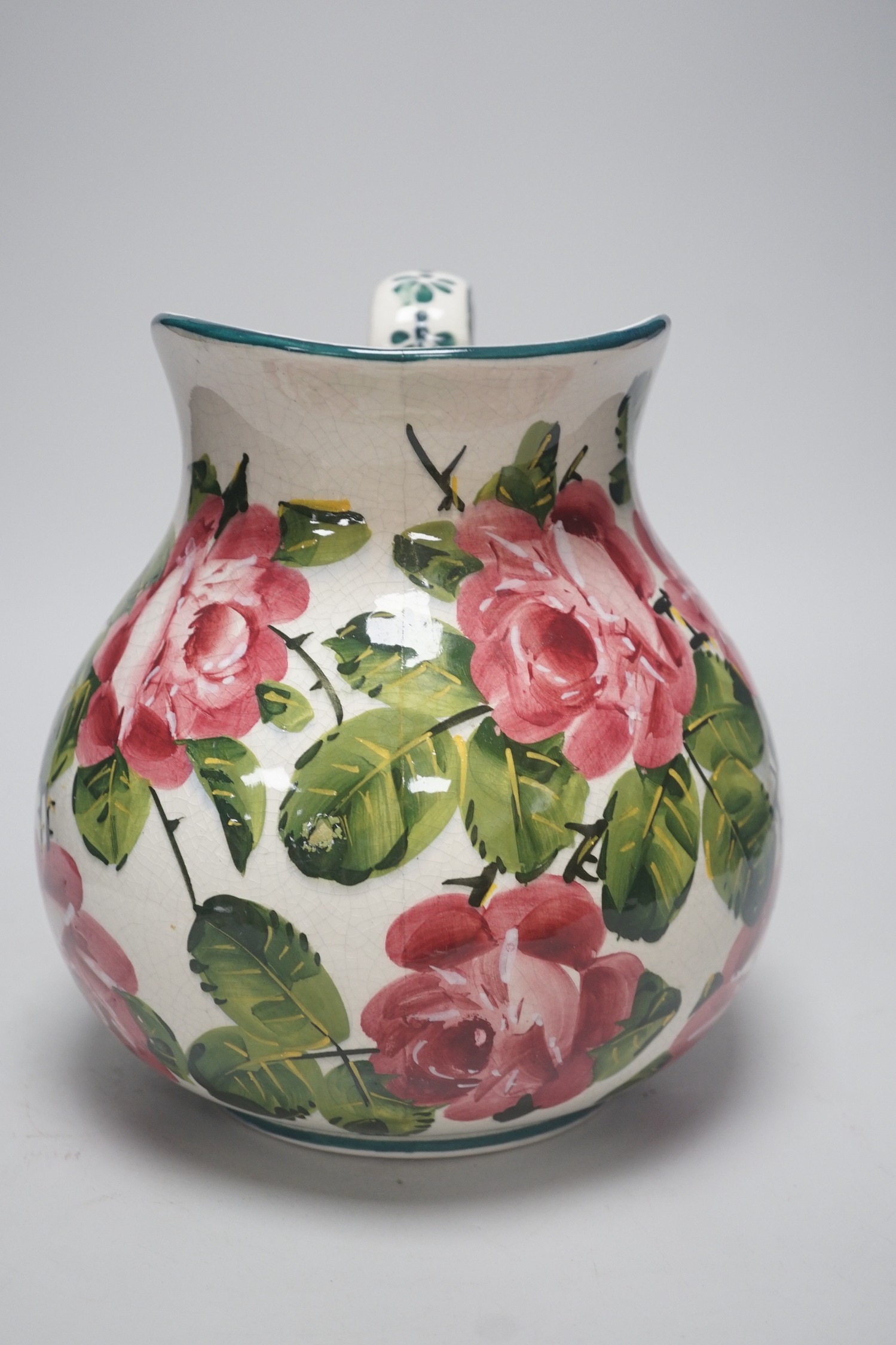 A Wemyss ewer, ‘cabbage roses’ patterns, painted Wemyss mark to base. 26cm tall